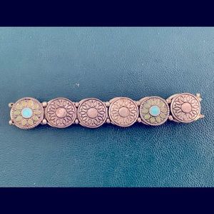 Silver tone bracelet with multi color accents